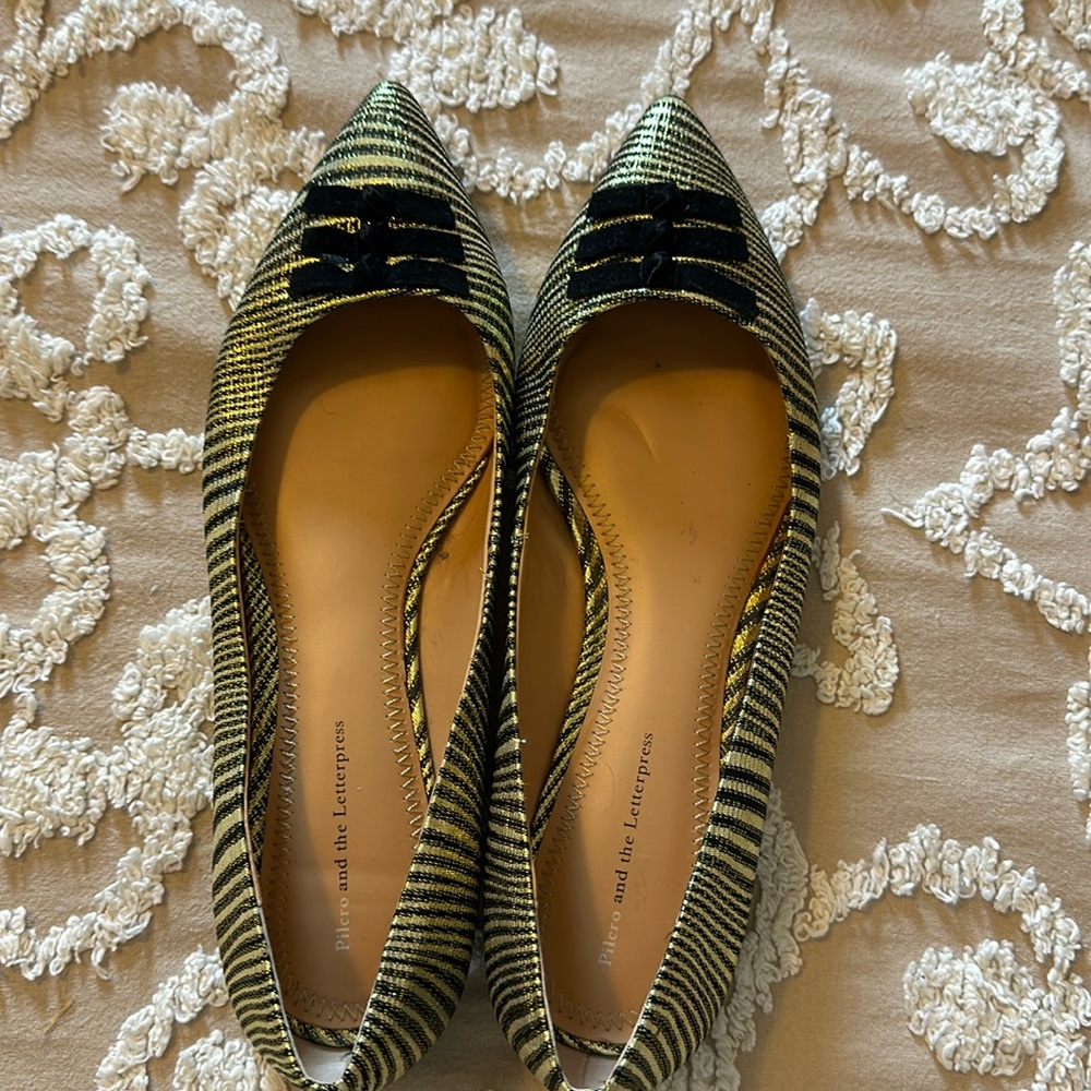 Black and gold flats from Anthropologie